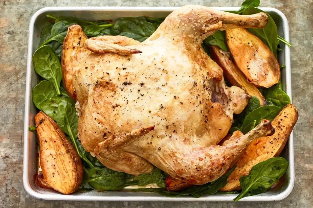 Sheet Pan Roast Chicken With Roasted Sweet Potatoes and Wilted Spinach