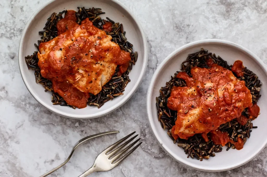 Tomato-Poached Cod With Wild Rice